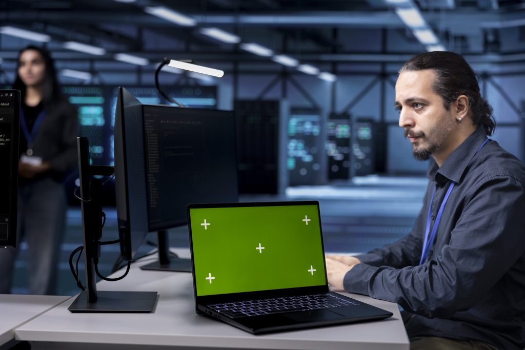 employee monitoring data center mainframes with mockup notebook